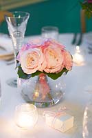 Pink roses in an arrangement for a wedding. Rose 'Keira' a cut flower variety from David Austin Roses