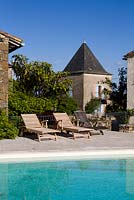 The swimming pool in garden setting at Domaine de Cambou, Verfeil, Haute-Garonne, Midi Pyranees, France.