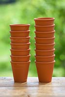 Tower of small terracotta pots