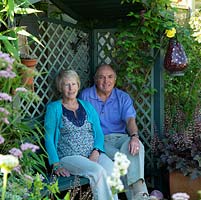 Pauline and Brian Clark in their garden 