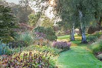 The Dell Garden, Bressingham at first light in September. Bressingham Gardens, Norfolk, UK.