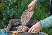 Creating a mixture of gravel and compost