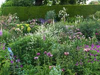 Aconite, poppy, lupin, Crambe cordifolia, clematis, foxglove, euphorbia, peony, hardy geranium, golden oats, catmint, roses - Rosy Cushion, Louise Odier, F. Pichard, Queen of Denmark, Empress Josephine, Redoute.