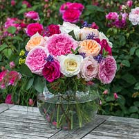 Bouquet of roses in vase. Many trials have been carried out to find the best cut flowers in terms of a stiff stem, good shape and fragrance, and resilience to travelling. David Austin Roses. 
