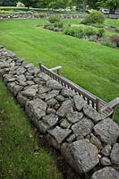 One of the many beautiful stone walls at White Flower Farm, Connecticut, USA