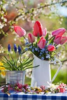 Floral arrangements of tulips and muscari.