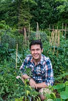 James  Wong, ethnobotanist, TV presenter, author and celebrity gardener, in his own small vegetable patch where he experiments with unusual edible plants.