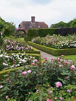 Shrub Rose Garden. Rosa Erfurt, Mary Rose, Jacques Cartier, Brother Cadfael, Miss Alice, Cottage Rose, Comte de Chambord, St Swithun. Arch: Mdme Isaac Pereire.