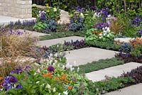 The Cotswold Way, Malvern Spring Gardening Show 2015, with Cotswold stepping stone path with herbs, bordered by tiarella, stipa, alliums and aquilegia 