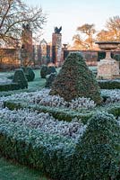 Formal box parterre with frost. Helmingham Hall, Suffolk
