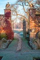 Gates opening up to parkland at Helmingham Hall, Suffolk