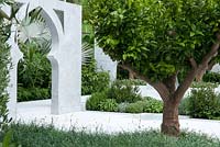The Beauty of Islam, a garden that reflects Arabic and Islamic culture which includes  plants, Citrus auranticum trees, Myrtus communis, Thymus vulgaris and serphyllum, Chomomile. RHS Chelsea Flower Show, 2015
