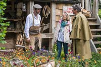 Charlie Groves, a Sussex Trug basket maker, chatting to Alan Titchmarsh.  A Trugmaker's Garden, RHS Chelsea Flower Show, 2015