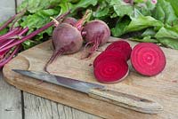 Beetroot 'Detroit Dark Red' sliced on a chopping board