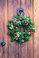 Christmas wreath mounted on a door