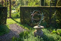 Chilstone Italian Sundial in the Peony Garden at Goltho Gardens, Goltho, Lincolnshire, UK. Spring, May 2015.