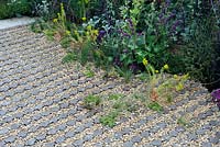 Garden paving of cast stone insets filled with gravel - RHS Hampton Court Palace Flower show 2015