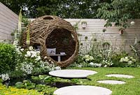 Living Landscapes: City Twitchers Garden - Chamomile nobile 'Treneague' lawn with stone stepping stones and patio, small pond with water lilies and  a rill - Designer CouCou Design, Sarah Keyser - Sponsor Living Landscapes - RHS Hampton Court Flower Show 2015 - awarded Silver gilt