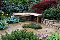 Stone terrace, simple wooden seat