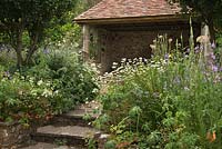 Summer House in the Terraced Garden.  Burrow Farm Gardens, Axminster, Devon. July. 