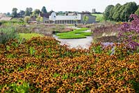 View to the Gallery from the Oudolf Field. Hauser and Wirth, Bruton, Somerset. Planting design by Piet Oudolf.