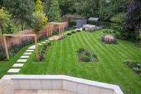 View from balcony to the path leading through the garden to the sunken seating area