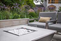 Liquid propane fire pit and seats in the sunken seating area