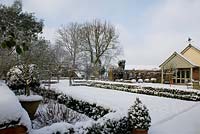 Snow covered country garden, winter