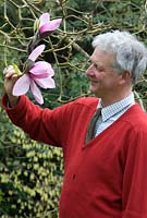Rupert Eley with a Magnolia flower at The Place For Plants, April. 