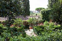 The Limonaia. Hedges of box. Villa I Tatti, Florence, Italy. September. Garden designed by Cecil Pinsent for Bernard Berenson. Built between 1911 and 1919 and considered one of the first examples of Renaissance Revival gardens. Owned by Harvard University.