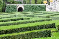 The Lower Garden: view across the box hedges, Villa La Foce, near Chianciano Terme, Siena, Tuscany, Italy. October.