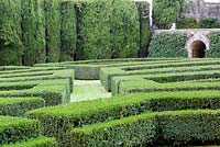 The Lower Garden: view across the box hedges. Villa La Foce, near Chianciano Terme, Siena, Tuscany, Italy. October. 