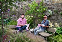 Derek Brewster, right and Nic Howard, garden designer, with Harry, the pet beagle, relax in their small, irregularly shaped courtyard garden measuring 13m corner to corner, on the longest side.