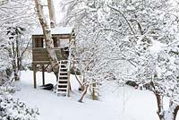 Treehouse in snow