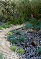 Timber path running through slate garden planted, Chelsea Flower Show 2003