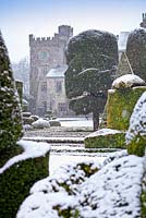 Snow at Levens Hall Topiary Garden, Cumbria, UK