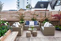 Outside seating area on a London roof terrace. April. 