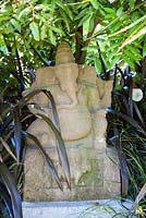 Antique asian Elephant statue at Bhudevi Estate garden, Marlborough, New Zealand.