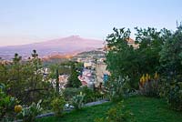 Early morning view of Etna from one of the terraces. Casa Cuseni in Taormina, Sicily, Italy 