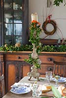 Garlands, wreaths and table arrangements all made from British grown flowers and foliage in the workshop. Common Flower Farm, Somerset