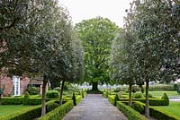 Mitton Manor Garden in spring, Staffordshire. Formal parterre front garden