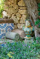 Bust of Catherine de Medici in the seating area in the arabic garden. San Giuliano Estate. Sicily, Italy