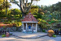 The Shell House in the Mediterranean Garden with shell mosaics by Lucy Dorrien-Smith. Tresco Abbey Garden, Tresco, Isles of Scilly. 
