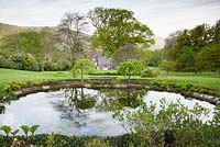 Upper pond with views down the garden, across the house and to the surrounding Conwy countryside.