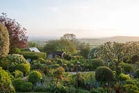 View over garden towards Blackmore Vale at sunset