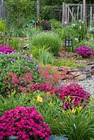 Summer border with Dianthus, Heuchera, Geranium and Lavandula 