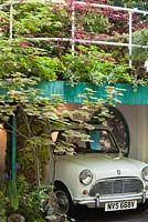 Garage with green roof. Senri-Sentei - Garage Garden. RHS Chelsea Flower Show 2016, Designer: Kazyuki Ishihara, Sponsor: Senri-Sentei