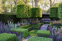The Husqvarna Garden. Formal garden with clipped Hornbean Aerial hedging and sunken lawn. RHS Chelsea Flower Show 2016, Designer: Charlie Albone, Sponsors: Husqvarna