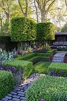 The Husqvarna Garden. Formal garden with clipped Hornbean. Aerial hedging and sunken lawn.
