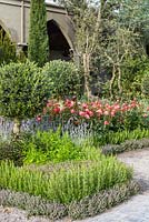 A cloister garden with Rosa, Rosmarinus and Lavendula  at The Garden of Romance -  RHS Malvern Spring Festival 2016 - Design: Villaggio Verde - Gold Medal